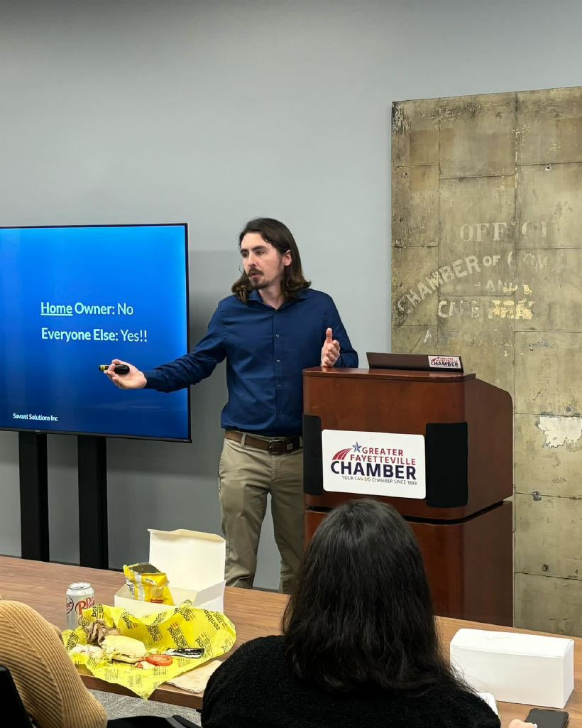 Jacob Zepp presenting to members at a Greater Fayetteville Chamber event