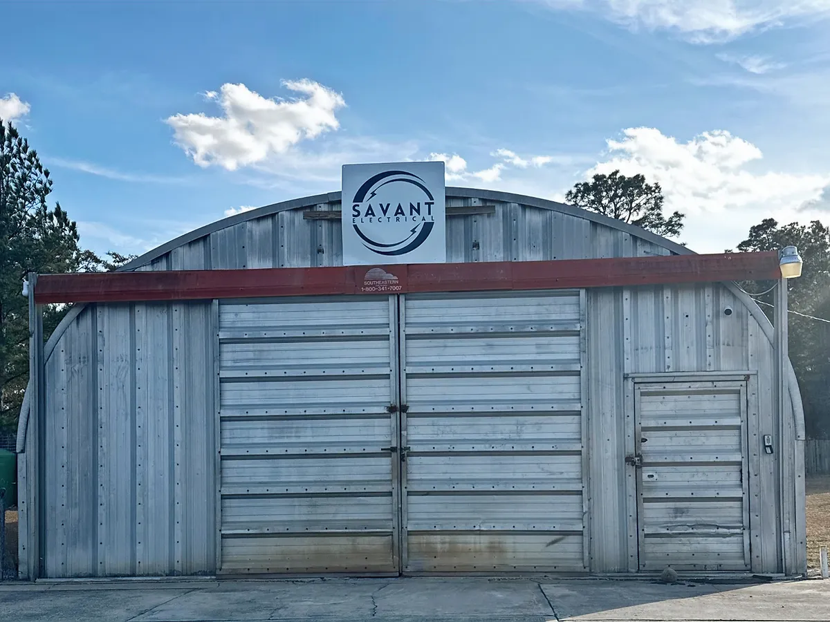 Savant Electrical shop building with company sign in Raeford, North Carolina